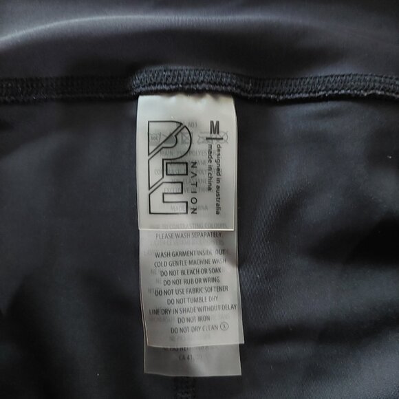 P.E Nation Black and Orange Leggings - Picture 3 of 4